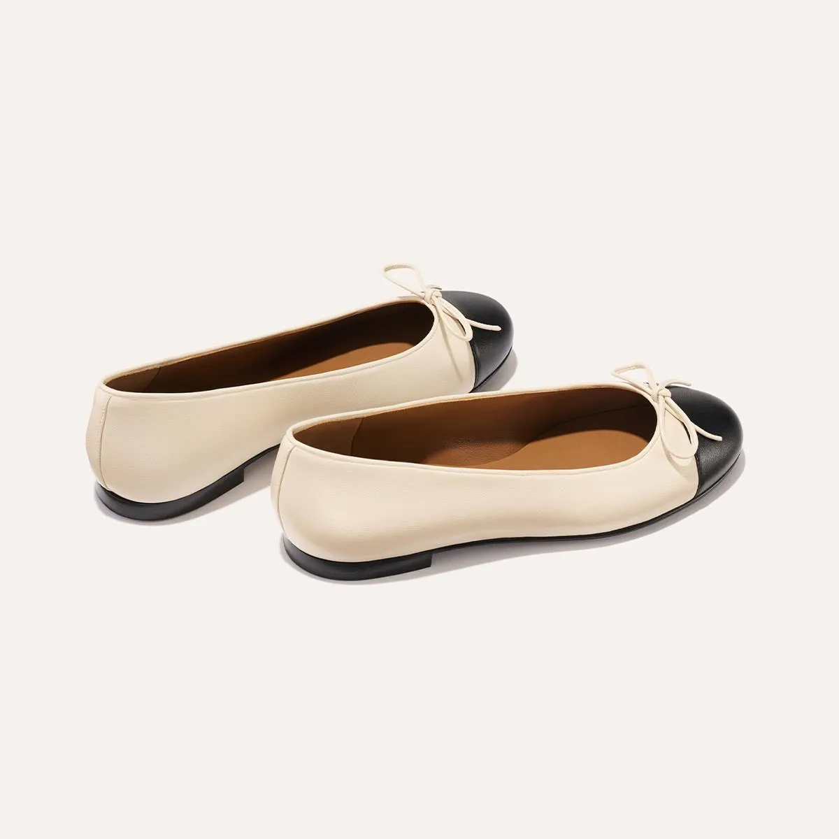 The Demi - Ecru and Black Nappa city - specific benefits stylish user