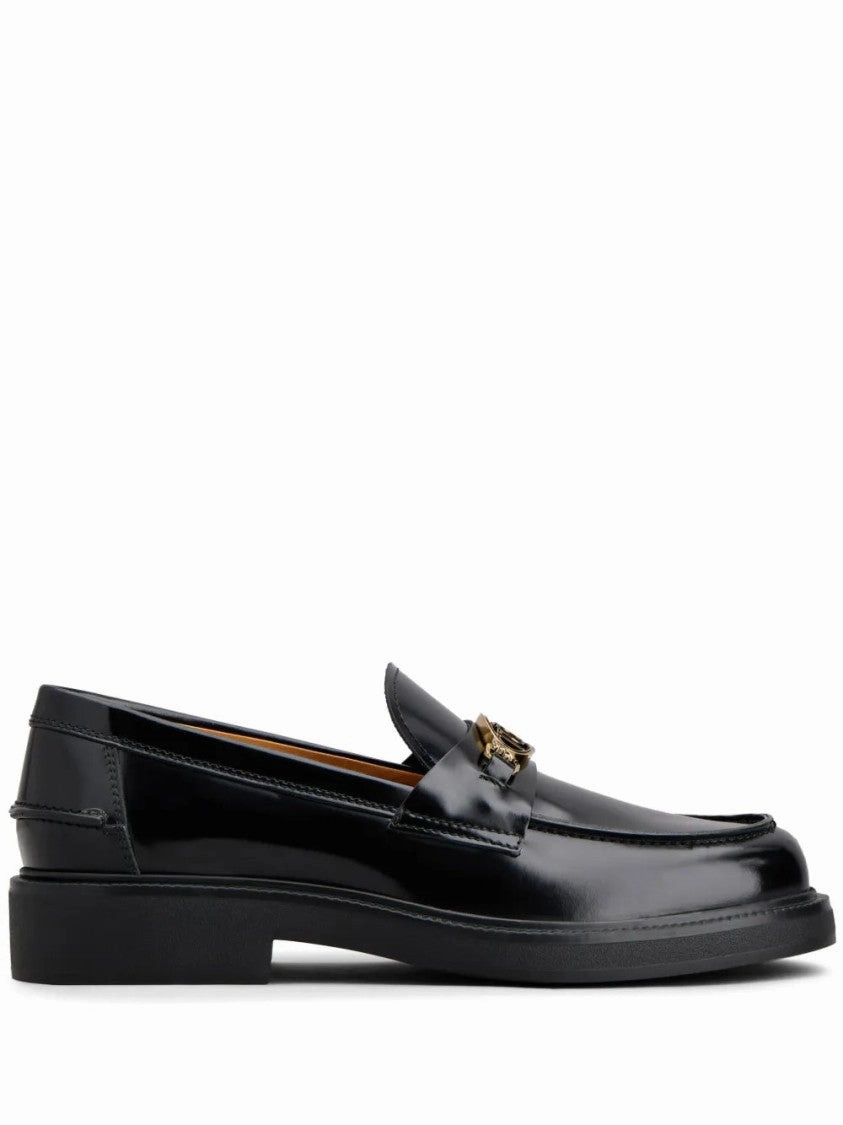 Glossy Black Leather Loafers With Decorative Emblem Foot Free