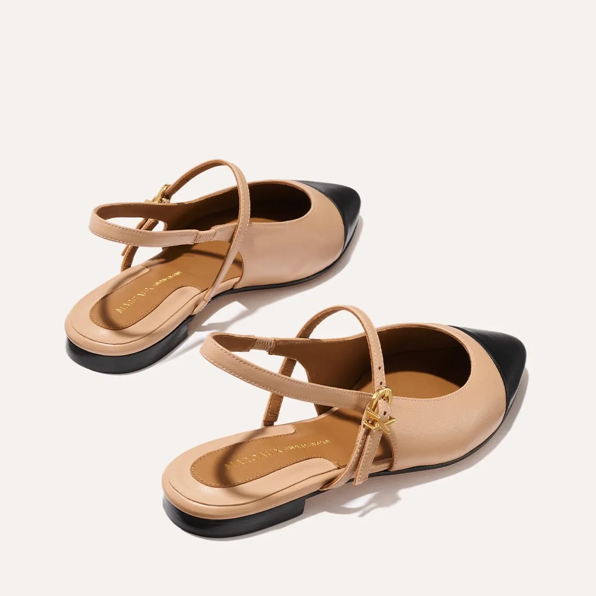 group trip The Crosby Sling - Dune and Black Nappa