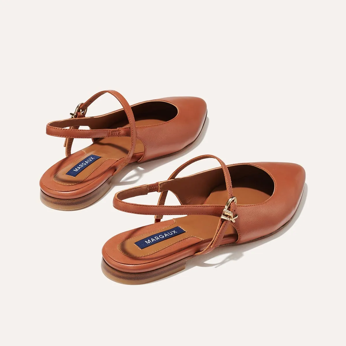 The Crosby Sling - Saddle Nappa Impact Dispersal Geometry